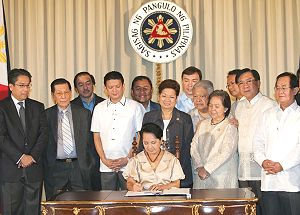 Arroyo signing tax relief bill into law