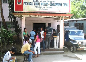 Job applicants waiting outside social welfare office in Samar