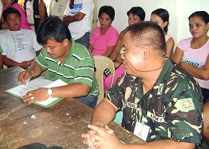 MOA signing between Brgy. 13 and 8ID on Adopt a Barangay
