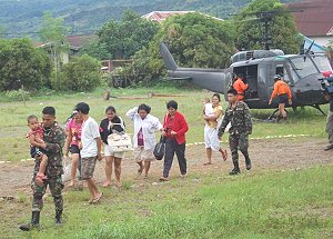 Army airlifting flood victims in St. Bernard, Southern Leyte