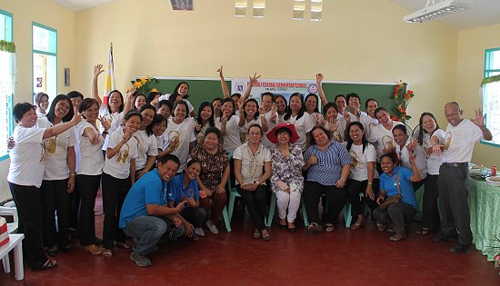 Teachers of Palapag I Central School with PLDT Head