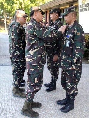 donning of ranks to newly promoted officers
