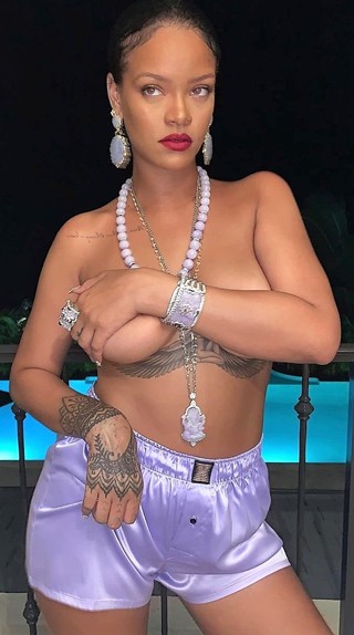 Rihanna wearing Lord Ganesha pendant
